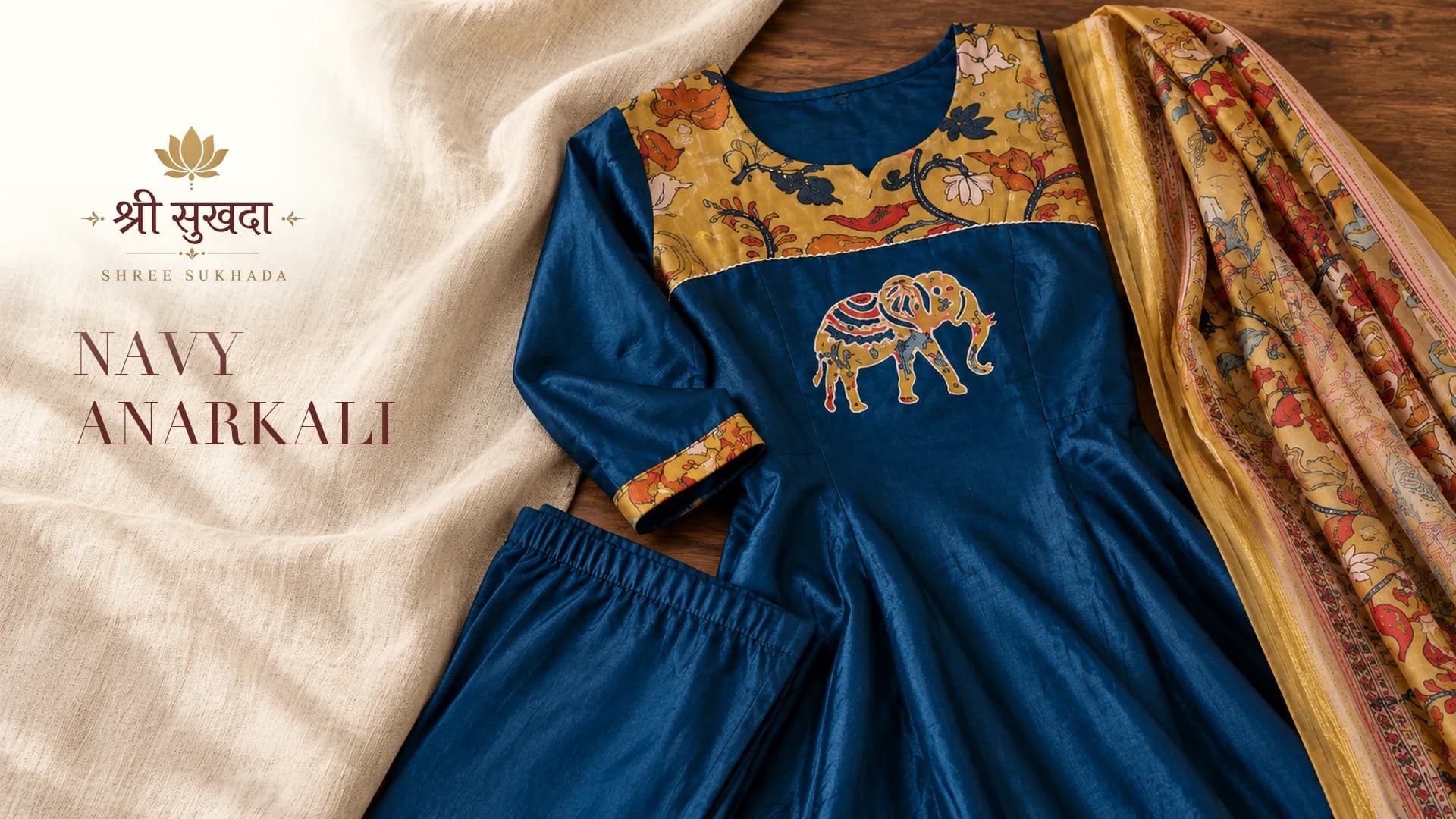 Navy Anarkali set with an elephant motif, a printed yoke and a printed dupatta